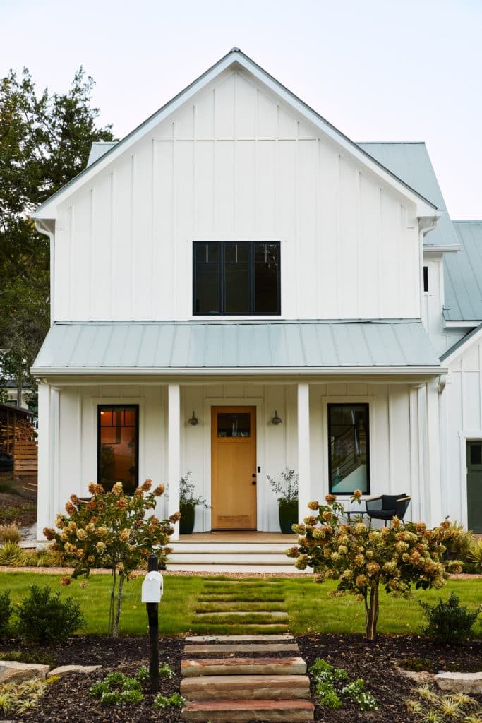 Welcoming home exterior framed by landscaped garden